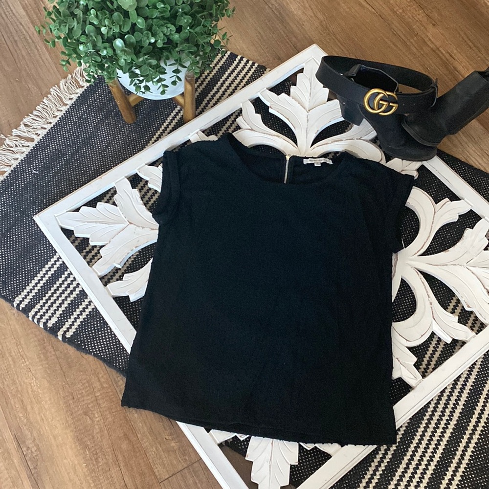 Rose + Olive black shirt with polka dot detail. Size medium.